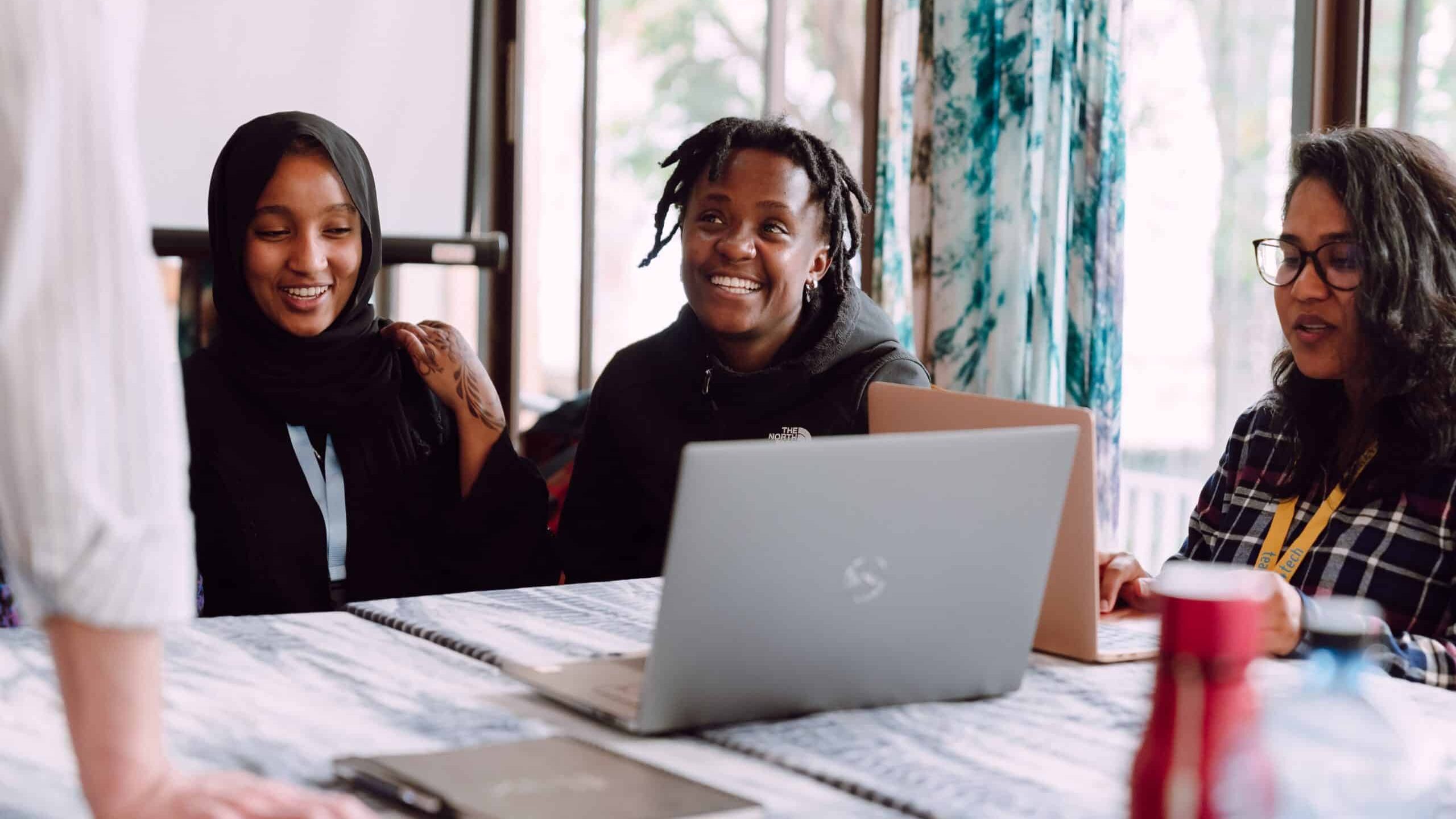 Kenyan developers collaborating in a modern tech workspace